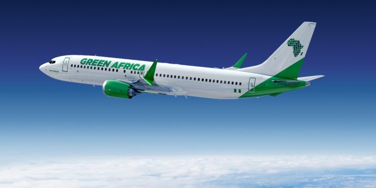 A Green Africa Airways promo plane in flight. The Lagos-based airline and Boeing have announced a commitment for up to 100 737 MAX 8 aircraft. www.exchange.co.tz