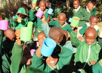Pupils at Oserian Primary School enjoying a cup of uji in their first day of school in 2019. This follows the introduction of the school feeding programme by Oserian Development Company. www.exchange.co.tz
