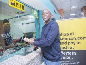 A Western Union agent in Nairobi, Kenya. Western Union has unveiled a new payment option that allows Amazon customers in Kenya to pay in local currency for their Amazon purchases. www.exchange.co.tz