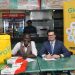 Joseph Claver, Simbisa Brands’ Head of Business Development (L)and Glovo's General Manager for Kenya, William Benthall during the signing of a partnership between Glovo and Simbisa Brands/Courtesy