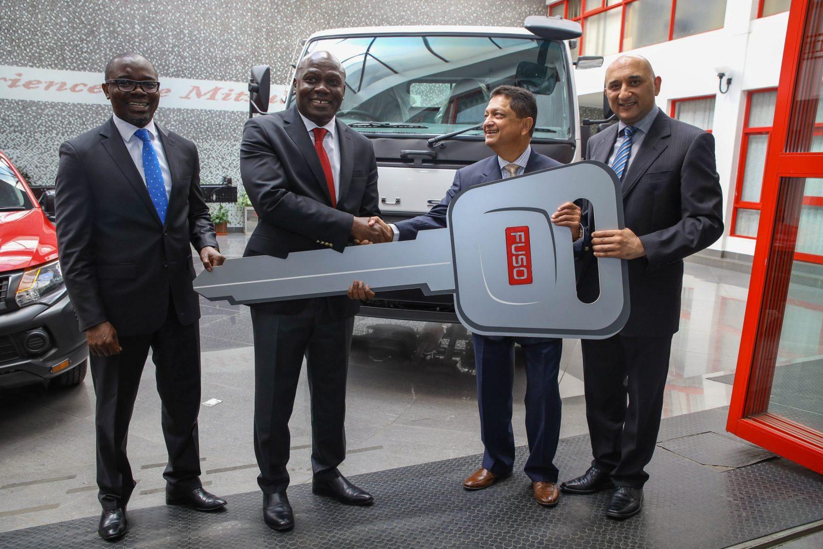 Ameet Shroff (second right), hands over a dummy key to Kennedy Nyakomitta, GM Asset Finance DTB after a partnership signing that will see SMEs get 100% financed new Fuso trucks courtesy of DTB’s motor financing Scheme dubbed “Beba Leo”. Looking on is George Otiende, (left) Head of Branches and Alternate Channels DTB and Mehul Sachdev, (right) Senior Brand Manager Fuso (right). www.theexchange.africa