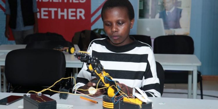 A student works on one of the robots at the lab. Riara University says that the need for intelligent products and technologies has seen continuous growth in the world today. www.theexchange.africa
