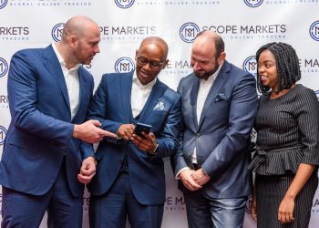 The Scope Markets launch. Kevin Ng’anga- Scope Markets Kenya CEO demonstrates the Scope Platform to Serkan Ismailoglu- Director Scope Markets global while Dianah Igati - Kenya office Legal and Compliance head and Jacob Plattner - Group CEO Scope Markets look on. www.theexchange.africa