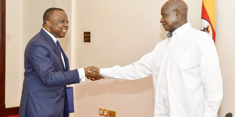 Jules-Armand Aniambossou, the Ambassador of France to Uganda left, President Yoweri Museveni- Uganda's president, Right
Source: Soft Power News