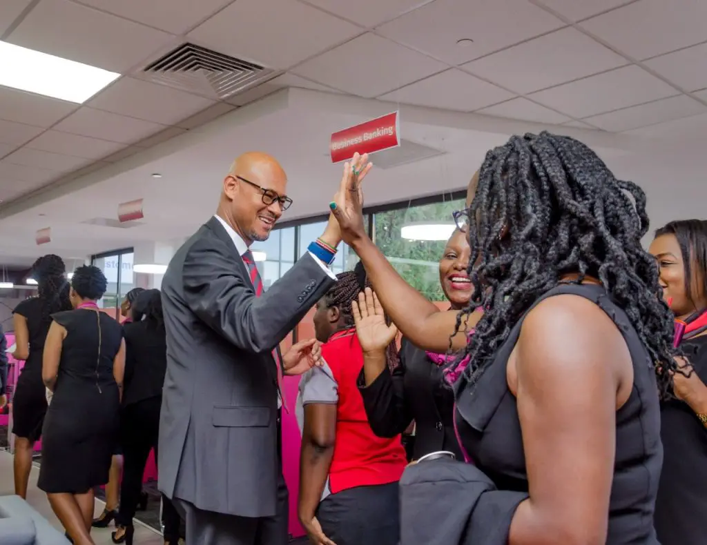 Absa bank Kenya Managing Director Jeremy Awori with staff during the official unveiling of the Absa brand in Kenya. The bank has set aside Sh10 billion for women entrepreneurs. www.theexchange.africa