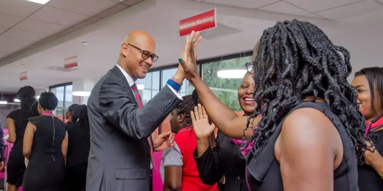Absa bank Kenya Managing Director Jeremy Awori with staff during the official unveiling of the Absa brand in Kenya. The bank has set aside Sh10 billion for women entrepreneurs. www.theexchange.africa