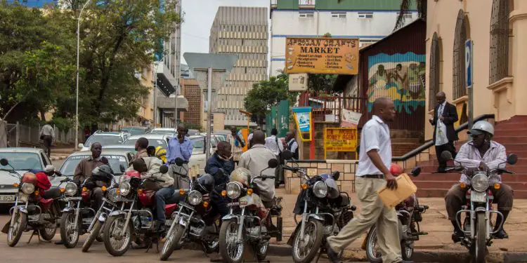 A stage for Boda-bodas (motorcycle taxis) in Kampala, Uganda. (Photo: Sarah Farhat/ The World Bank) :Exchange