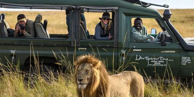 Tourists at Maasai Mara National Park in Kenya. East Africa introduced the single tourist visa in 2014 as a pilot between Kenya, Uganda, and Rwanda enabling free movement in the region. www.theexchange.africa