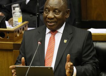 South African President Cyril Ramaphosa delivers his State of the Nation Address in Cape Town, South Africa, Thursday, Feb. 13, 2020. (Sumaya Hisham/Pool Photo via AP): Exchange