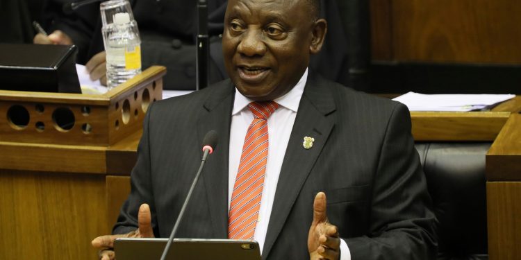 South African President Cyril Ramaphosa delivers his State of the Nation Address in Cape Town, South Africa, Thursday, Feb. 13, 2020. (Sumaya Hisham/Pool Photo via AP): Exchange