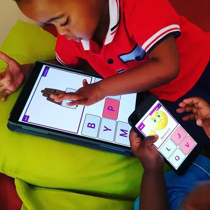 A child using the Fingerspelling Pro for Kids. The mobile application is meant to empower those with hearing impairment. www.theexchange.africa