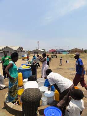 waiting for water at the borehole
