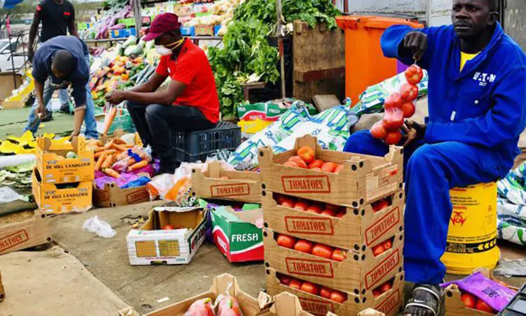 Selling foodstuff. Despite its job creating potential, agriculture remains the poorest funded by governments making it vulnerable to natural calamities and pandemics like Covid-19. www.theexchange.africa