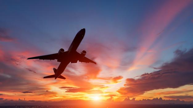 silhouette passenger plane flying sunset 12338 145