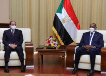 Sudan's Sovereign Council Chief General Abdel Fattah al-Burhan meets with Egyptian President Abdel Fatah al-Sisi, in Khartoum, Sudan March 6, 2021. Sudan Sovereign Council/Handout via REUTERS ATTENTION EDITORS - THIS IMAGE WAS PROVIDED BY A THIRD PARTY.
