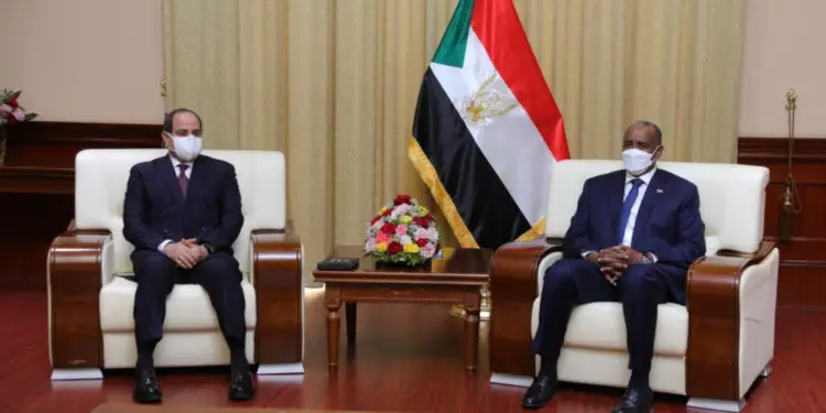 Sudan's Sovereign Council Chief General Abdel Fattah al-Burhan meets with Egyptian President Abdel Fatah al-Sisi, in Khartoum, Sudan March 6, 2021. Sudan Sovereign Council/Handout via REUTERS ATTENTION EDITORS - THIS IMAGE WAS PROVIDED BY A THIRD PARTY.