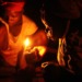 Children using a smoky lamp to study. More than 50 per cent of Sub-Saharan population is without electricity. www.theexchange.africa