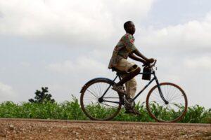 A young man riding a bike. Bicycles for Growth Initiative aims to improve sustainable access to affordable bicycles in sub-Saharan Africa. www.theexchange.africa