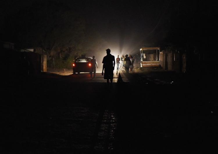 A street in Zimbabwe at night. Zimbabwe’s power cuts are sounding the death knell for the struggling economy. www.theexchange.africa