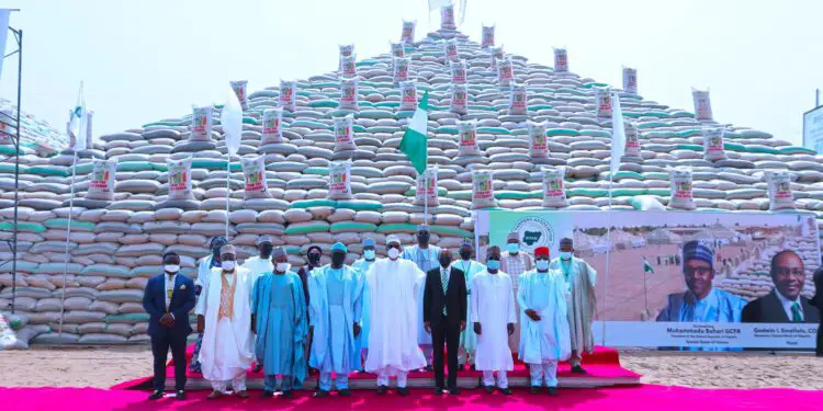 Buhari launches 13 million bags of Rice to reduce the prices. www.theexchange.africa