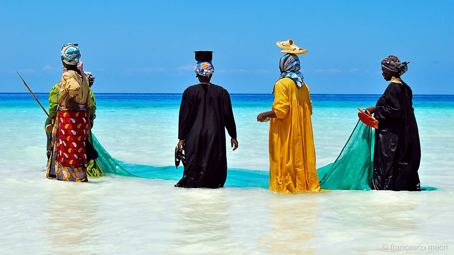 Zanzibari women along the shores of the Indian Ocean. www.theexchange.africa