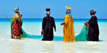 Zanzibari women along the shores of the Indian Ocean. www.theexchange.africa