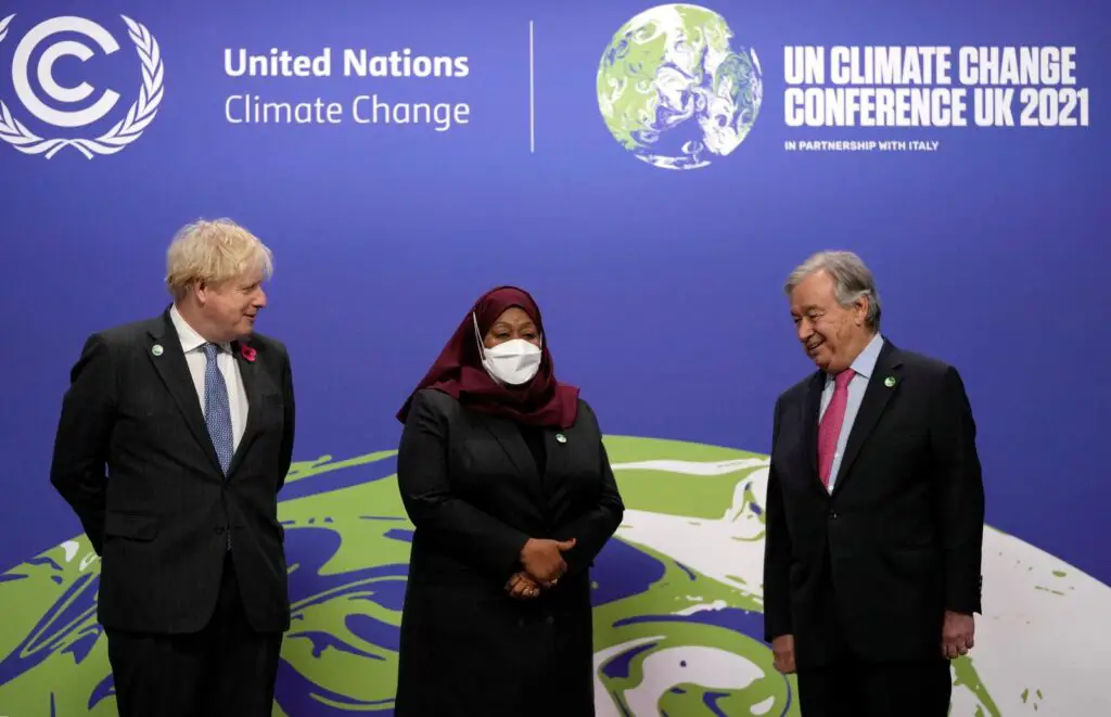COP26 in Glasgow. President Samia Suluhu of Tanzania between Prime Minister Boris of the United Kingdom and Secretary-General of the United Nations Guterres. www.theexchange.africa