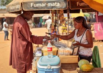 A trader in East Africa. A proper economic renaissance in Africa is pegged on continent's youthful population, creativity and the end of colonial-era politicians. www.theexchange.africa
