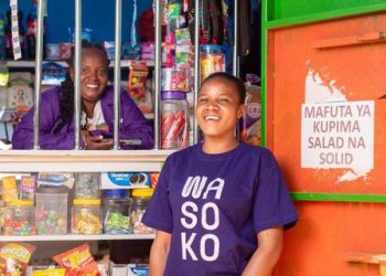 A kiosk vendor wearing a Wasoko t-shirt. Sokowatch has rebranded to Wasoko following its entry into Ivory Coast and Senegal. www.theexchange.africa