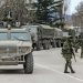 Russian military vehicles patrolling Sevastopol in Ukraine, on March 1, 2014, weeks before Russia annexed Crimea. Putin is seeking to demilitarize, ‘de-NAZI-fy’ Ukraine. www.theexchange.africa
