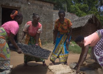 Women working to produce the reusable, organic charcoal in Zanzibar. The women are trained to convert biomass to charcoal. www.theexchange.africa