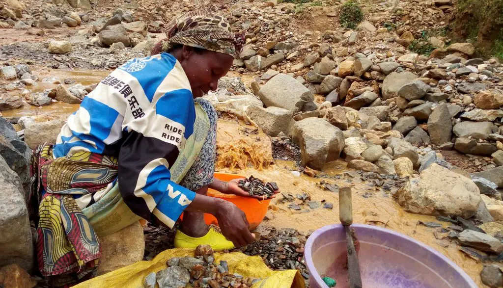 An African woman working on a mine