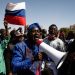 Africans flying a Russian flag in Ouagadougou, Burkina Faso, in January. The US is forcing Africa to support it for its Russia attacks but the continent remains uncommitted. www.theexchange.africa