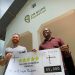 Daniel Cates with a dummy cheque for helping the CR Hope Foundation with building a school in Zanzibar. www.theexchange.africa