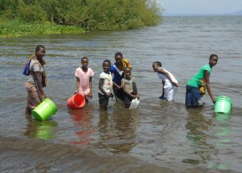 Village girls and women fetch water in a river. Lack of water affects this group the most forcing them to travel long distances in search of water. Photo/RotaryWASH