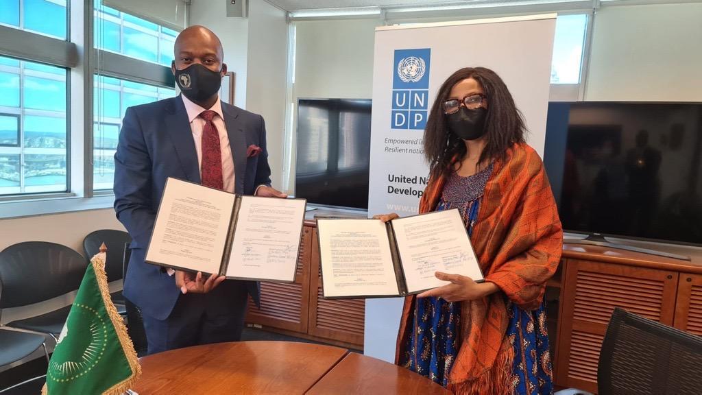 June Njoroge.Could AfCFTA be the Answer to Africas Poverty Struggle.Caption.The AfCFTA SG Wamkele Menesigns a partnership with UNDP to promote trade in Africa.Source AU