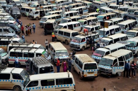 People board public transport at the New Taxi Park in Kampala, Uganda, Jan. 1, 2022. (Photo by Nicholas Kajoba/Xinhua) https://theexchange.africa/