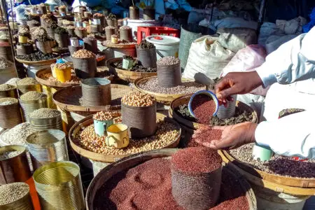 Small grains like Rapoko are on display at an outdoor market in Bulawayo, Zimbabwe. www.theexchange.africa