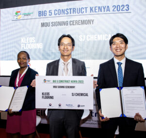 Maureen Wambui - MD, Kleos Flooring East Africa(farthest left) signing MoU with SJ Chemical from South Korea, officiated by KOTRA MD Mr. EOM Ikhyun (at the center)