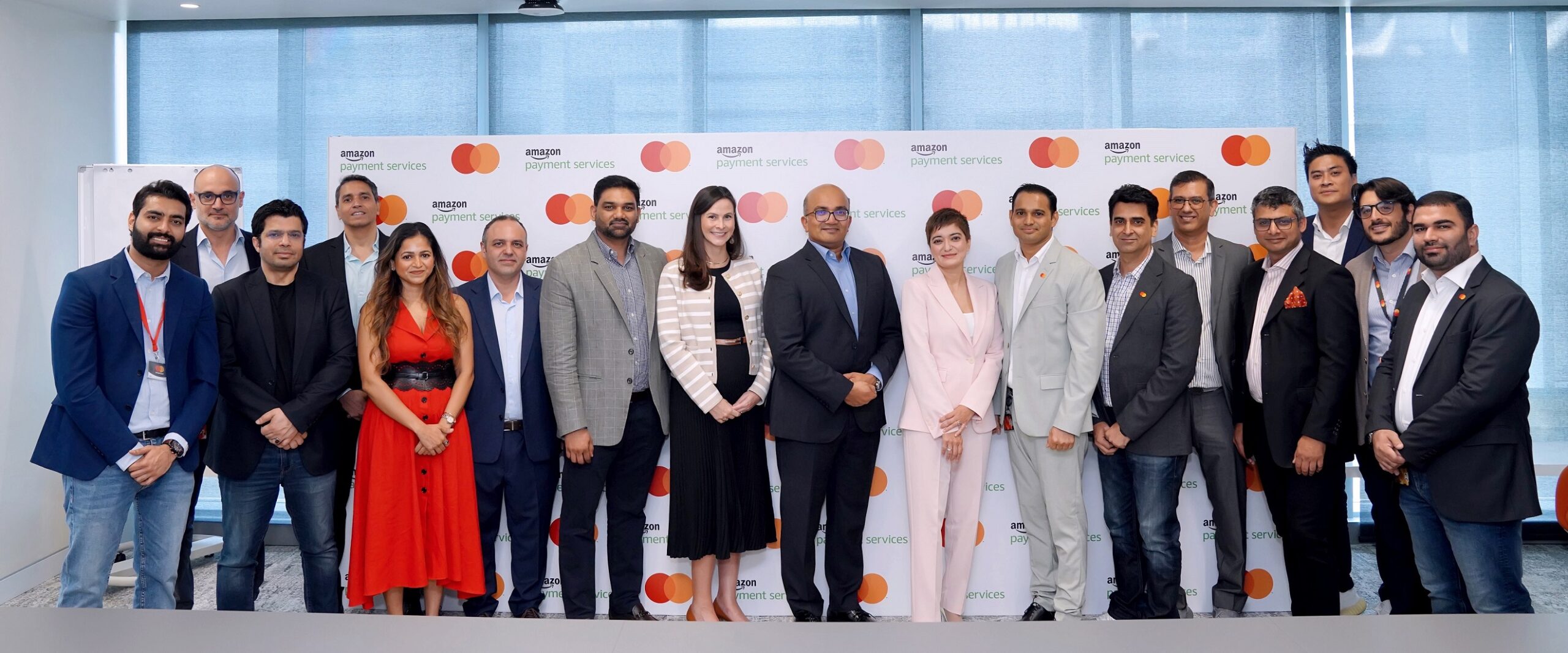 Mastercard and Amazon Payment Services teams at the signing scaled